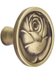 McKenna Rose Knob in Antique Brass.
